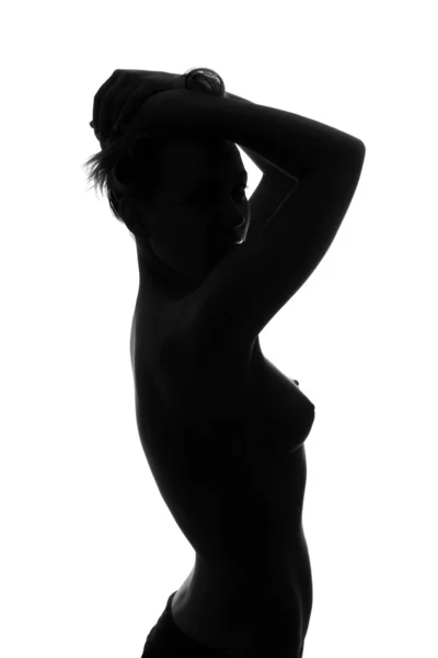 stock image Silhouette of a sexy naked young woman. Isolated