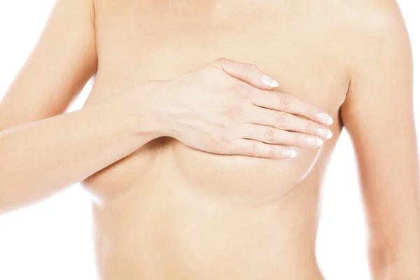 stock image Breast cancer, woman holding her breast